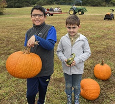 boys at pumpkin patch